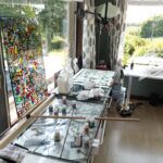 Area of my studio with large lightbox where I paint stained glass