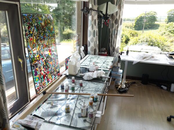 Area of my studio with large lightbox where I paint stained glass