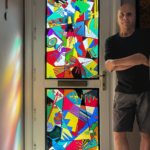 Michael Autumn standing beside his Nazca Lines "Stained Glass"