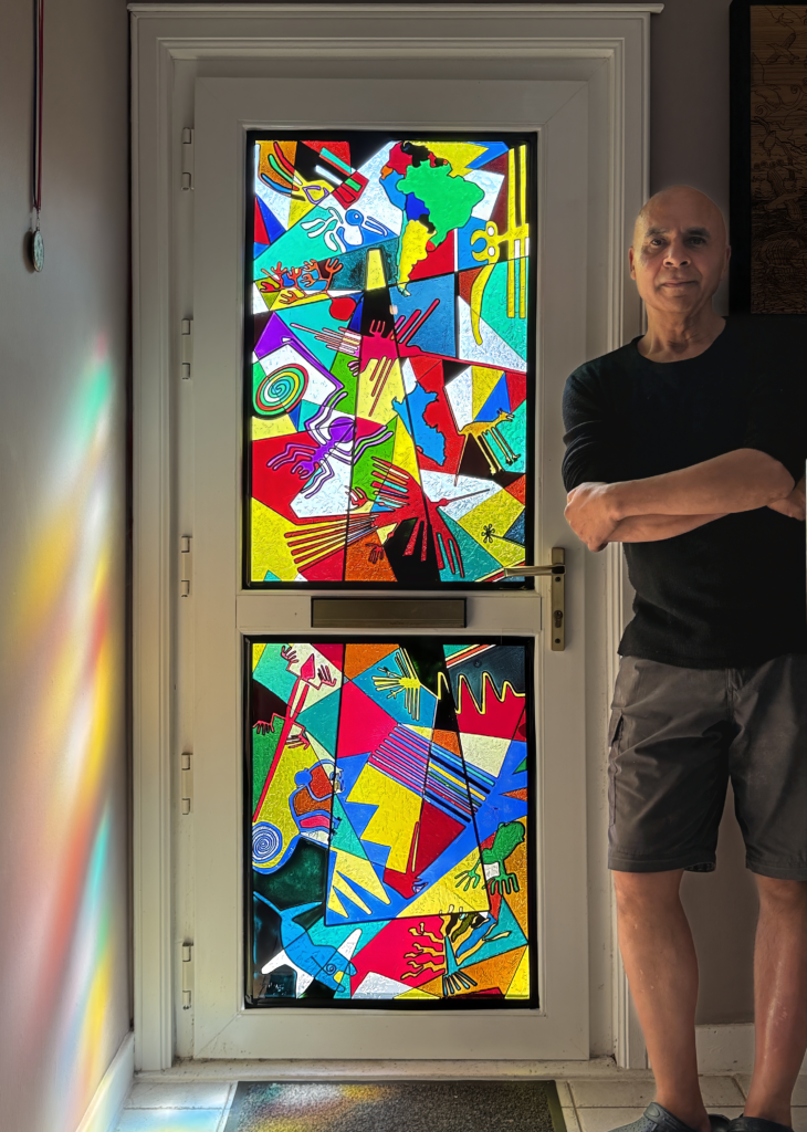 Michael Autumn standing beside his Nazca Lines "Stained Glass"